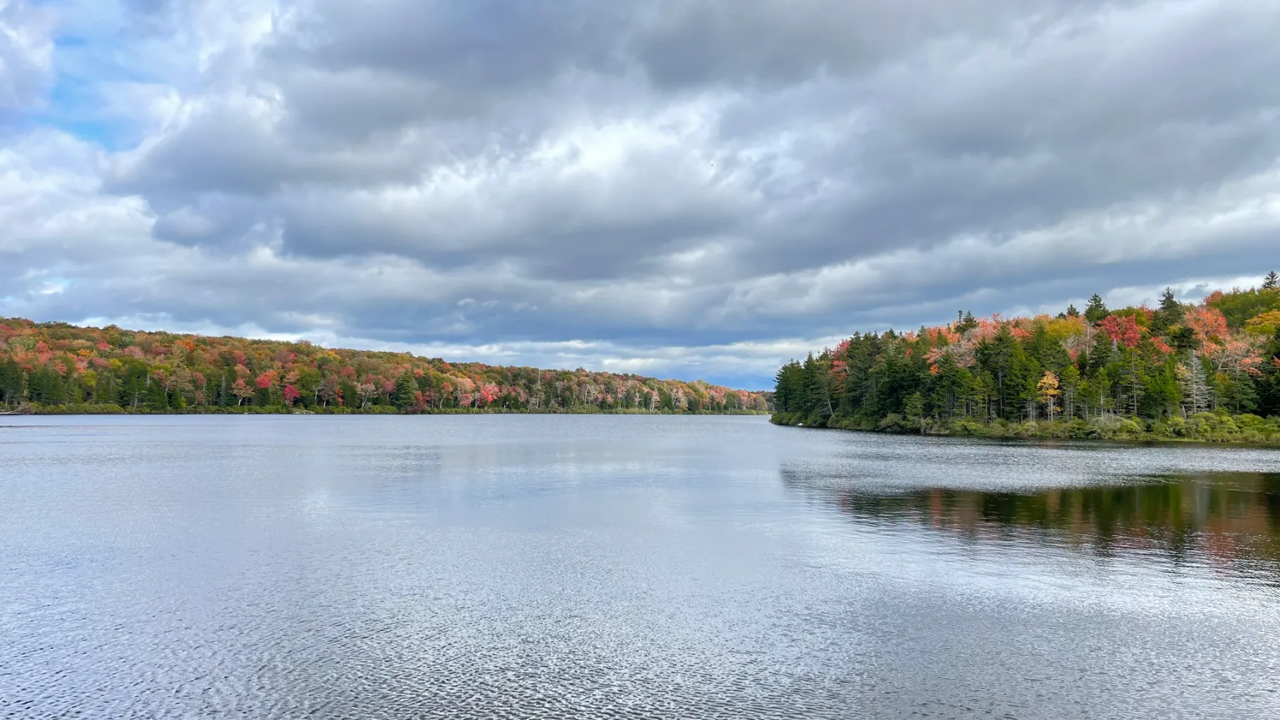 Autumn foliage across the lake near the chalet